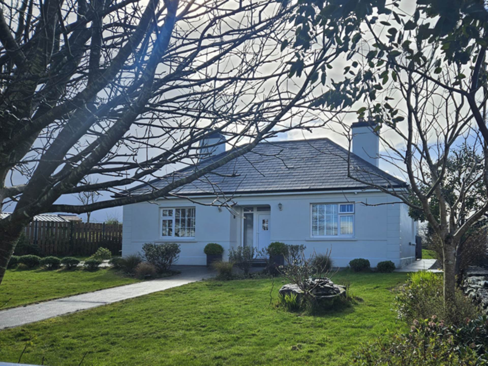 Detached bungalow on 0.93 acre site